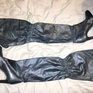 Coach knee high leather boots.